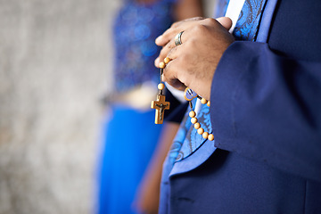 Image showing Man, hands and christianity with cross for religion, belief or praying of priest or preacher at church. Closeup of male person, christian or religious person with rosary beads for tradition or ritual