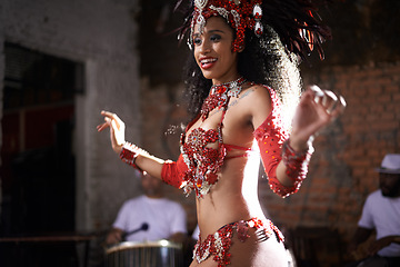 Image showing Happy woman, samba dancer and festival with band for performance at carnival or concert. Face of Brazilian female person or exotic performer with smile or cultural fashion for dancing or party in Rio