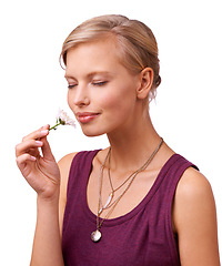 Image showing Studio, woman and smelling a daisy by white background and scent of perfume of natural botanicals. Model, idea and creative inspiration with flower for stress relief and closed eyes with floral plant