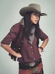 Image showing Woman is confused, fashion and cowboy clothes in portrait in studio, western character and costume on white background. Wild west style, outlaw cosplay and vintage apparel with doubt or question