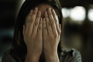 Image showing Anxiety, horror and hands on face of woman to cover reaction from fear, panic or terror closeup. Stress, depression and mental health with scared young person hiding from danger, drama or violence