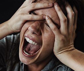 Image showing Face, horror and phobia with woman screaming in studio on black background for reaction to fear. Anxiety, mental health and shouting with scared young person in dark for stress, nightmare or terror