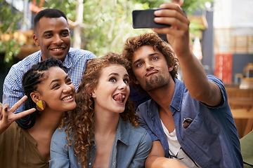 Image showing Funny, face and group of students for selfie at university campus for profile picture update or social media post. Men, women and happy friends with technology for memory, diversity and college fun