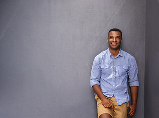 Image showing Thinking, smile and black man on wall background with idea, vision or inspiration for decision on mockup space Fashion, style and happy African person in casual clothes, dream and planning future