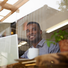 Image showing Man, laptop and thinking for writing, search or planning for idea with smile, coffee and remote work. Contemplating, freelance and African person with computer for internet, browsing and solution