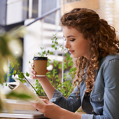 Image showing Cappuccino, reading and woman with book in cafeteria for knowledge with literature in morning. Diner, student and female person with novel or story drinking latte, espresso or coffee in restaurant.
