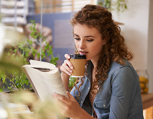 Image showing Coffee, reading and woman with book in restaurant for knowledge with literature in morning. Diner, student and female person with novel or story drinking latte, espresso or cappuccino in cafeteria.