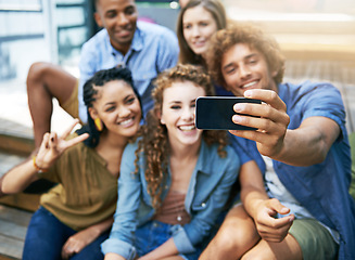 Image showing Hand, students and group or smile for selfie at university campus for profile picture update or social media post. Men, women and happy friends with technology for memory, diversity and college fun