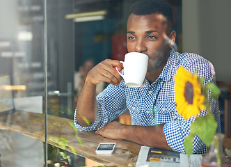 Image showing Man, coffee and thinking by window in cafe with daydreaming for creative idea, inspiration and reflection. African person, contemplating and thoughtful with beverage in diner for research motivation