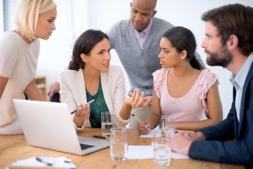 Image showing Team, laptop and business people training with leader, planning or brainstorming in creative startup. Group, computer and mentor coaching diverse employees, interns and serious designers in meeting