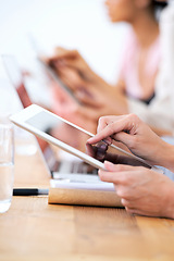 Image showing Hands, tablet and business person closeup in meeting for conference, networking or communication online. Desk, scroll and digital technology for planning, research and designer at creative startup