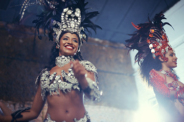 Image showing Smile, carnival or happy woman in costume for event, music culture or night celebration in Brazil. Outdoor, performance or girl dancers with samba at festival party, parade or show in Rio de Janeiro