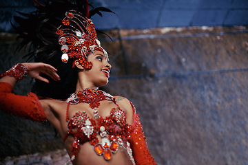 Image showing Samba, carnival or happy woman in costume for event, music culture or night celebration in Brazil. Outdoor, performance or proud dancer with smile at festival party, parade or show in Rio de Janeiro