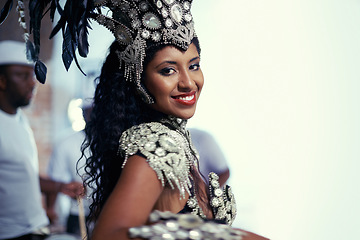 Image showing Samba, festival or happy woman in costume or portrait for celebration, music culture or band in Brazil. Event, night or proud girl dancer with smile at carnival, parade or fun show in Rio de Janeiro