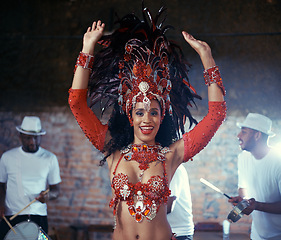 Image showing Smile, carnival or happy woman in costume or portrait for celebration, music culture or band in Brazil. Night event, party or girl dancer with energy at festival, parade or fun show in Rio de Janeiro