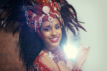 Image showing Event, carnival or happy woman in costume or portrait for celebration, music culture or samba in Brazil. Face, night or proud girl dancer with smile at festival, parade or fun show in Rio de Janeiro