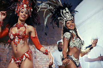 Image showing Portrait, carnival or women in costume dancing for celebration, music culture or samba in Brazil. Girl friends, night or dancers with rhythm or fashion at festival, parade or show in Rio de Janeiro