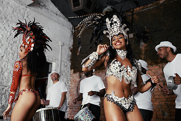 Image showing Performance, dance and happy women at carnival in costume for celebration, music culture and band in Brazil. Samba, party and girl friends together at festival, parade or stage show in Rio de Janeiro