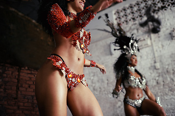 Image showing Parade, dance and women at carnival in costume for celebration, music culture and happy band in Brazil. Samba, party and girl friends together at festival, performance or stage show in Rio de Janeiro