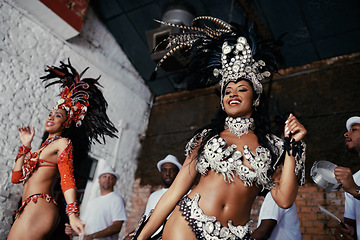 Image showing Fun, dance and women at carnival in costume for celebration, music culture and happy band in Brazil. Samba, party and girl friends together at festival, parade or stage performance in Rio de Janeiro