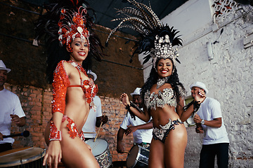 Image showing Portrait, dance and women at carnival in costume for celebration, music culture and happy band in Brazil. Samba, party and friends together with smile at festival, parade or show in Rio de Janeiro