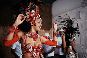 Image showing Smile, dance and women at carnival in costume for celebration, music culture and happy band in Brazil. Samba, party and girl friends together at festival, parade or stage show in Rio de Janeiro.