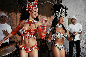 Image showing Music, samba and women at carnival in costume for celebration, performance culture and happy band in Brazil. Dance, party and girl friends together at festival, parade or stage show in Rio de Janeiro