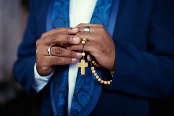Image showing Hands, prayer with beads and Christian man in worship for religion, trust and spiritual hope with peace. Holy love, mindfulness and preacher faith for God praying with gratitude, rosary and cross.