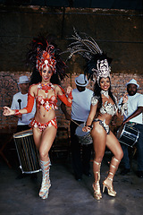 Image showing Portrait, samba and women at carnival in costume for celebration, music culture and happy band in Brazil. Dance, party and girl friends together at festival, parade or stage show in Rio de Janeiro