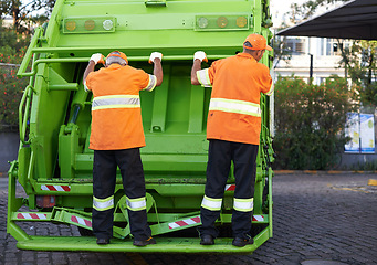 Image showing Garbage truck, men and service for waste management and teamwork with routine and cleaning the city. Employees, recycle and environment with transportation and green energy with trash and sanitation