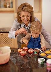 Image showing Help, grandmother and child in kitchen for baking cupcake with sprinkle. Home, chef for growth and development with family and creativity for dessert ingredients, smile for fun activity apron