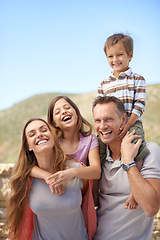 Image showing Parents, children and outdoor portrait as family or holiday connection in nature or explore park, relax or vacation. Mother, father and siblings on shoulders in Florida or travel, adventure or fun