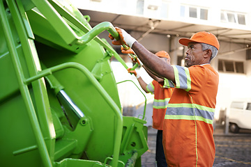 Image showing Trash, waste management and garbage truck with men in uniform cleaning outdoor on city street. Job, service and male people working with rubbish for sanitation, maintenance or collection of dirt.