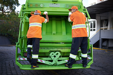Image showing Worker, garbage truck and collection service on street or public environment with teamwork or junk, recycling or waste management. Uniform, maintenance and New York dirt, transportation or sanitation