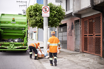 Image showing Men, garbage truck and collection service in city for public environment with teamwork, recycling or waste management. Uniform, maintenance and dirt transportation in New York, sanitation or refuse