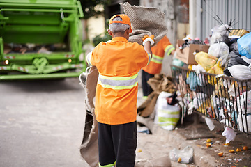 Image showing Man, garbage truck and trash collection on street for waste management in city for recycling plastic, junk or sanitation. Male person, uniform and dirt transportation in New York, pollution or mess