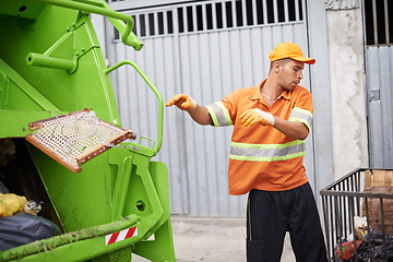 Image showing Garbage truck, dirt and worker with collection service on street in city for public environment cleaning. Junk, recycling and man working with waste or trash for road sanitation with transport.
