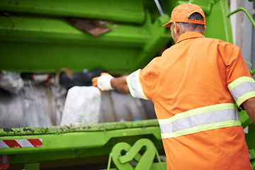 Image showing Man, garbage truck and dirt collection on street or recycling pollution for waste management, cleaning or environment. Male person, back and refuse transportation in New York, service or maintenance