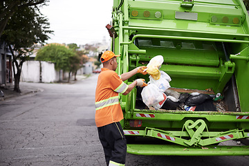 Image showing Garbage truck, dirt and man with collection service on street in city for public environment cleaning. Junk, recycling and male person working with waste or trash for road sanitation with transport.