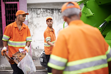 Image showing Men, garbage truck and worker in group on street for cleaning, public service and recycling for ecology. People, team and employees of government with vehicle, trash and stop pollution in Cape Town