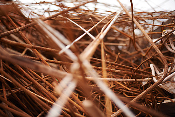 Image showing Construction, rust and steel bar for recycling in landfill, scrapyard or junkyard with waste. Environment, industrial and metal with disposal for upcycling, conservation for industrial maintenance