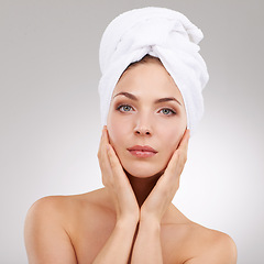 Image showing Beauty, cosmetics and portrait of woman with towel, natural glow and getting ready in studio. Dermatology, healthy skin and girl on white background with luxury facial, morning routine and skincare.