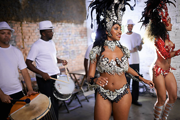 Image showing Stage, dance and women at carnival with costume for celebration, music culture and happy band performance in Brazil. Samba, party and friends at festival, parade or show in Rio de Janeiro with smile.