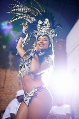 Image showing Carnival, dance and woman in costume at night for festival, celebration and holiday party. Street, samba dancer and person in masquerade outfit for performance, culture and event in Rio de Janeiro
