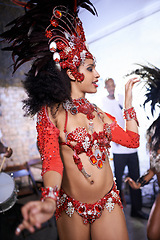 Image showing Dance, performance and woman at carnival, festival and event in Brazil for summer celebration of culture. Samba, dancer and creative fashion salsa with energy to music or people at club or party
