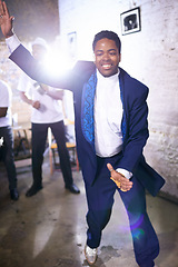 Image showing Happy, dance and black man at event with music, light and samba in celebration of culture in Brazil. African, person and moving with creative performance at party and joy from salsa or talent