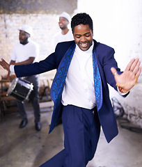 Image showing Happy, dance and black man at event with music, band and samba in celebration of culture in Brazil. Drums, musician and person moving with creative performance at party and joy from salsa or talent