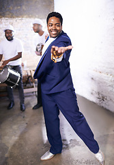 Image showing Happy, dance and black man at event with music, band and invitation to samba on floor in Brazil. Drums, musician and person moving with creative performance at party and joy from salsa or talent