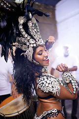 Image showing Dance, performance and woman at carnival, festival and event in Brazil for summer celebration of culture. Samba, dancer and creative fashion salsa with energy to music or people at club or party