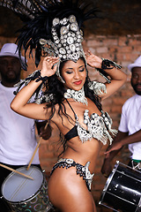 Image showing Dancer, carnival and woman with band with smile, pride and culture with group for music performance in night. People, men and dancing girl at event, party or celebration for history in Rio de Janeiro